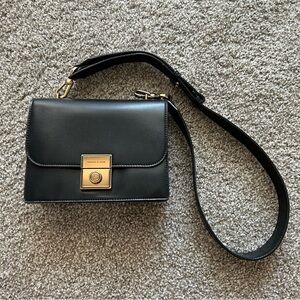 Charles & Keith Black Crossbody Bag with Gold-Tone Accents
